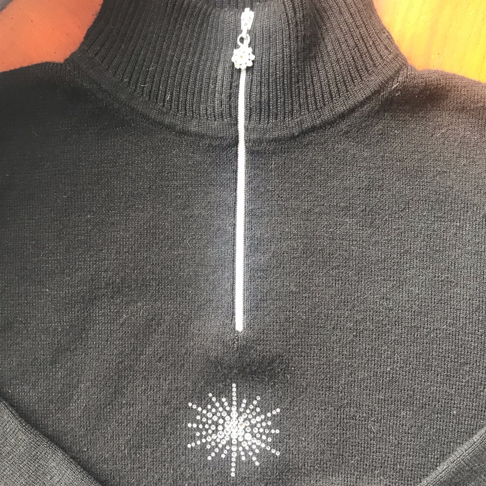 Woman’s Meister sweater.